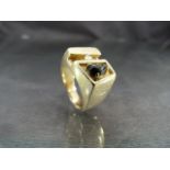 Gent's Contemporary 1970's design ring. Unmarked Gold (possibly 14K), set with an approx 10 point