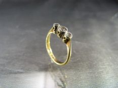 18ct PLAT 3 stone Diamond Ring. Centre Milligrain set Diamond approx: .10pts, with an approx .05pt