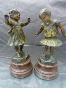 Pair of early 20th Century Bronzes of two young girls. One Blindfolded holding her arms out, The the