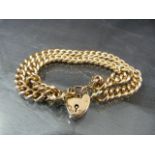 9ct Rose Gold (not Hollow) double chain bracelet with locking heart padlock and safety chain. Each