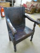 Oak Wainscot open Armchair c.late 17th century and later. Panelled back with arch carving. (possibly