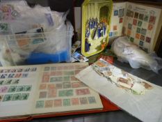 Large collection of loose stamps to include common wealth and around the world stamps