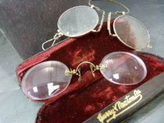 Two pairs of 19th century spectacles in cases. One pair by Curry and Paxton Ltd