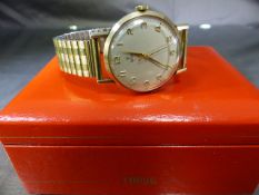 A vintage gentleman's Tudor by Rolex wrist watch with a 9ct yellow gold case, on a fixo-flex