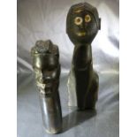 African Carvings - one hardwood african bust and the other carved in a Naive manner.