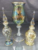 Three pieces of Egyptian Gilded Glassware to include two scent bottles of Irridescent colours and