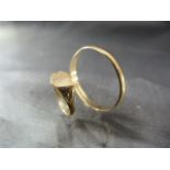 Large 9ct Gold thumb ring and a childrens signet ring - both 9ct and Total approx weight 2g