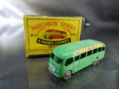 Moko Lesney Matchbox series no.21 Bedford Coach. Vehical in good condition. Box ends damaged.