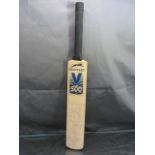 Signed cricket bat by teams Somerset V Northamptonshire. dated 2001.