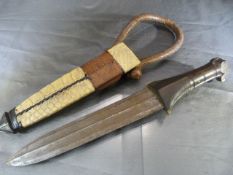 Antique Arm Knife with crocodile skin scabbard, simplistic blade with hardwood handle.