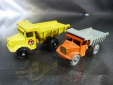 Matchbox Lesney No.6 tipper truck and a Similar Matchbox tipper truck in grey and red.