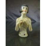 Tea cosy embellishment of a nude lady with bobbed hair (porcelain) c.1920's