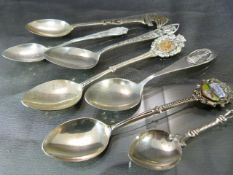 Seven hallmarked silver souvenir spoons, some with marks of 800 and others Sterling. Approx weight -