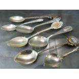 Seven hallmarked silver souvenir spoons, some with marks of 800 and others Sterling. Approx weight -