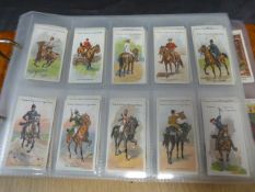 Cigarette card album containing Player's Riders of the World, Player's Derby and Grand National