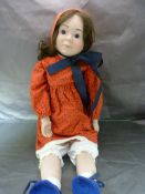 Alresford 71 Bisque headed doll. with red pattered dress