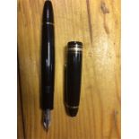 A Mont Blanc "Meisterstuck" black fountain pen with two tone nib (marked 14k) and Mont Blanc star to