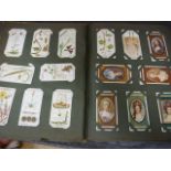 Album containing mixed lot of Cigarette cards to include Players and Will's