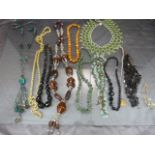 Small collection of costume jewellery to include natural stone bracelet, faux amber beads etc