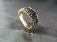 9ct Gold 8.5 mm wide band ring with 2 bands of illusion set small white diamonds, with a central