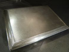 Hallmarked silver cigarette case with silver Gilt interior. Hallmarked for London 1939 by S J Rose &
