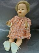 BND (British National Dolls) London early plastic doll in pink dress. Wear to the head hair.
