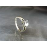 18ct White Gold 'square solitaire' style ring, made up of 4 small 'Princess Cut' Diamonds. The