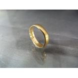 22ct Gold Wedding band with a slight dent UK - N. Approx weight - 2.3g