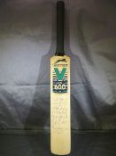 Signed miniature cricket bat by Somerset V Northamptonshire 2002