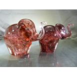 WEDGWOOD GLASSWARE - Pair of Wedgwood elephants in a pink mottled tone.