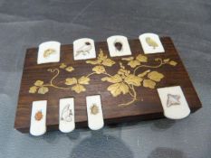 Rosewood Whist/Bezique marker with ivory tabs depicting various animals. Animals and insects