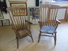 Windsor chairs - A near pair of Elm Windsor carver chairs with slatted backs.