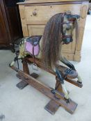 Antique Rocking Horse - Small dapple grey rocking horse with head leaning slightly right and