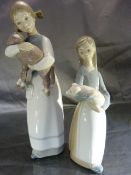 Lladro - Two Lladro figures - Maid holding a piglet B-4M and a Maid holding a Lamb 6S.