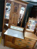 Arts and Crafts satinwood wardrobe with single door and two bevelled mirrored glass panels flanking.