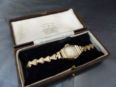 Spiegelhalter: Swiss made 15 jewel Spiegelhalter Bros Ltd London 9ct ladies cocktail/ dress watch.