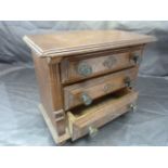 Apprentice oak early chest of three drawers. Each drawer carved with metal knobs and locks. Raised