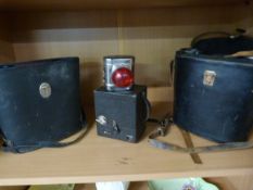 Pair of Boots Admiral binoculars, USSR military binoculars in case, Warwick No.2 camera and an
