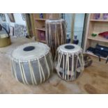 Three carved African drums