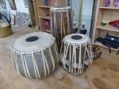 Three carved African drums