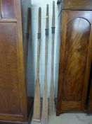Three vintage wooden oars