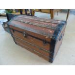 Large wooden bound domed trunk with original metal locks