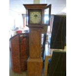Oak longcase clock with painted Dial having the Date Aperture. Floral motifs to corners with painted