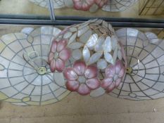 Collection of early Tiffany style lampshades. One with floral motif made from shell with two smaller