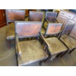 Set of six chairs in the Arts and Crafts style with leather pad seat and back. Carved Corinthian