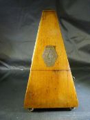 Early Rosewood cased Metronome of Pyramidal Form. Armorial type plaque to front bearing the makers