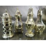 Four various silver hallmarked salt and pepper shakers (total weight approx. 155g)