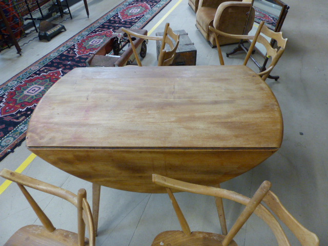 A set of four retro very rare Ercol 493 Windsor Carver Chairs. Only in production for three years - Image 4 of 8