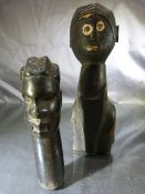 African Carvings - one hardwood african bust and the other carved in a Naive manner.