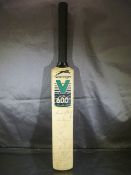 Signed miniature cricket bat by teams Somerset V Leicestershire 2001
